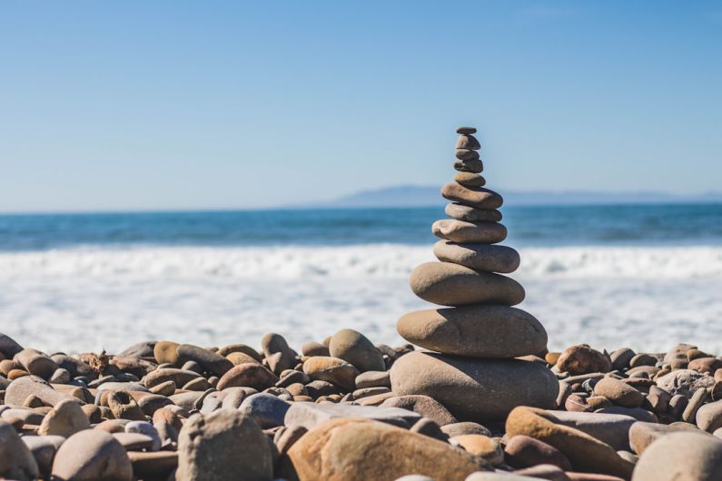 Work-life Balance - stack rock on seashore