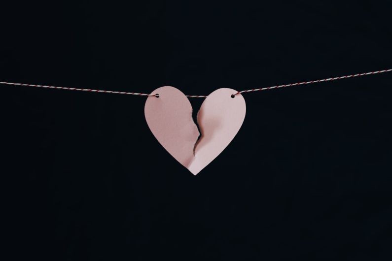 Breakups Healing - broken heart hanging on wire