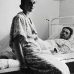 Sleep Healing - Aged photography of man lying on bed in hospital bed with woman sitting nearby