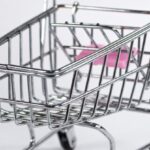 Mindful Shopping - A small pink shopping cart with a handle