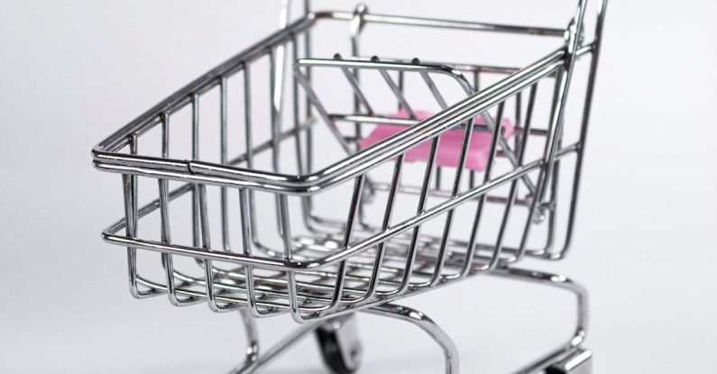 Mindful Shopping - A small pink shopping cart with a handle